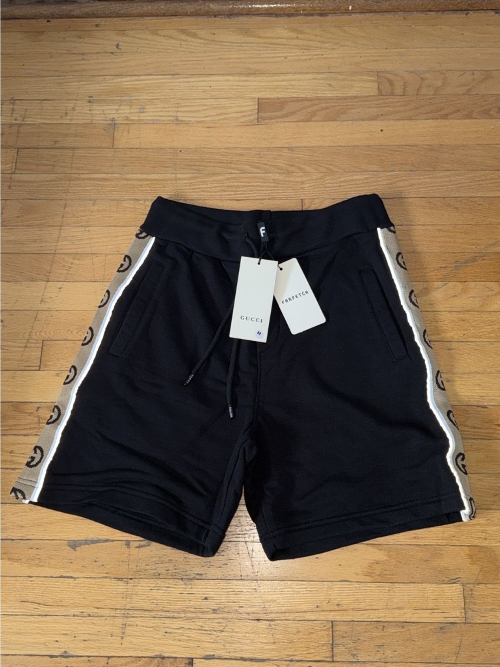 Gucci Black Men’s Shorts with Beige Logo Side Trim